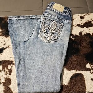 Light Blue Boot Cut Jeans with Faded Wash and Ornate Embroidery